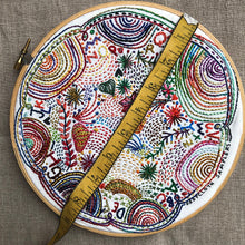 Load image into Gallery viewer, Dropcloth Embroidery Disco Nap sampler size. Completed sampler will be 9" x 9" Each kit includes sampler, instructions, hoop, needle, thread, and a free trial for a Creativebug class.