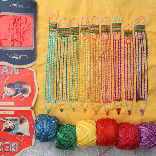 Pencil design embroidery by Rebecca Ringquist. ten pencils in ten colors. A project you can turn into a handy pencil case for school or a gift.