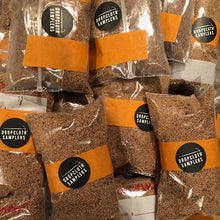 Load image into Gallery viewer, Three ounces of ground walnut shells. Perfect for filling your Dropcloth Samplers Pincushion Project.