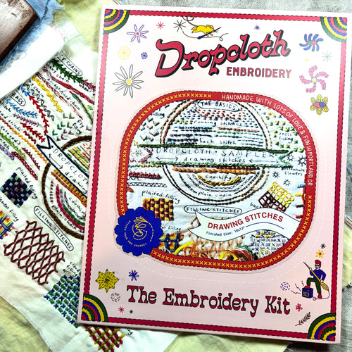 Dropcloth Embroidery Kit comes with Drawing Stitches sampler, hoop, instructions, thread, needle, and Free Creativebug trial