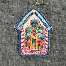 Load image into Gallery viewer, Dropcloth Embroidery Gingerbread House ornament sampler kit. Each kit includes sampler for one ornament, instructions, backing wool, hoop, needle, threads, and a free trial for a Creativebug class. 
