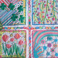 Garden Path is a collection of four unique florals scenes. Finished samplers can be framed or stitched into coasters or pattern weights. A Creativebug class walks you through the project.