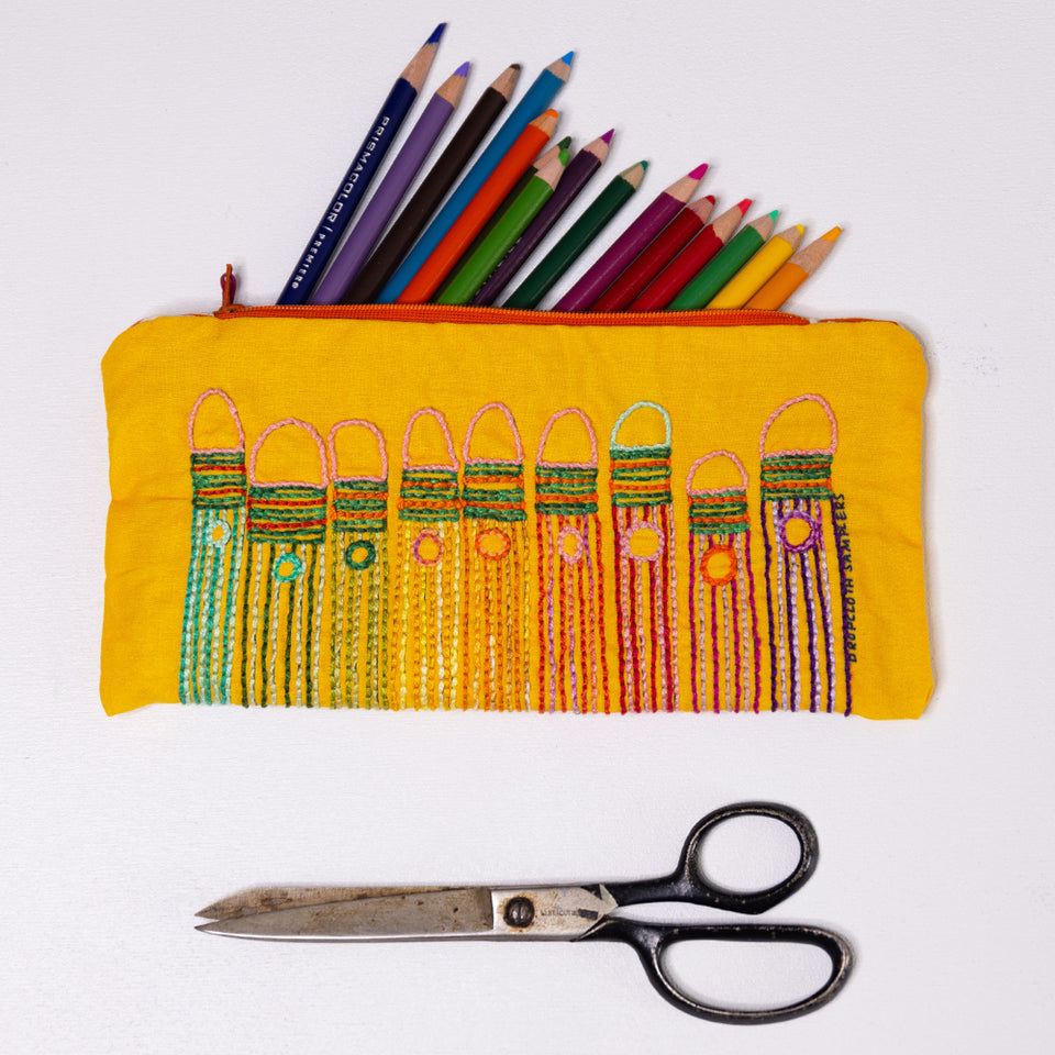 Pencil design embroidery by Rebecca Ringquist. ten pencils in ten colors. A project you can turn into a handy pencil case for school or a gift.