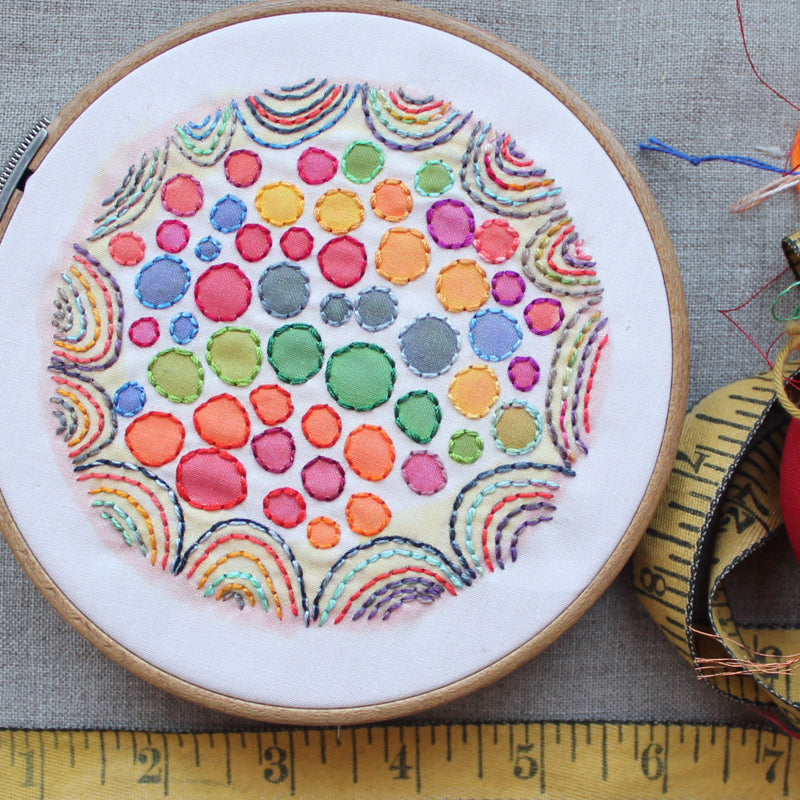 Dropcloth Samplers Colorburst sampler. Embroidery design: Bubblegum by Rebecca Ringquist